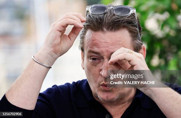 French actor Benoit Magimel poses during a photocall for the film "Omar la Fraise" at the 76th edition of the Cannes Film Festival in Cannes,...