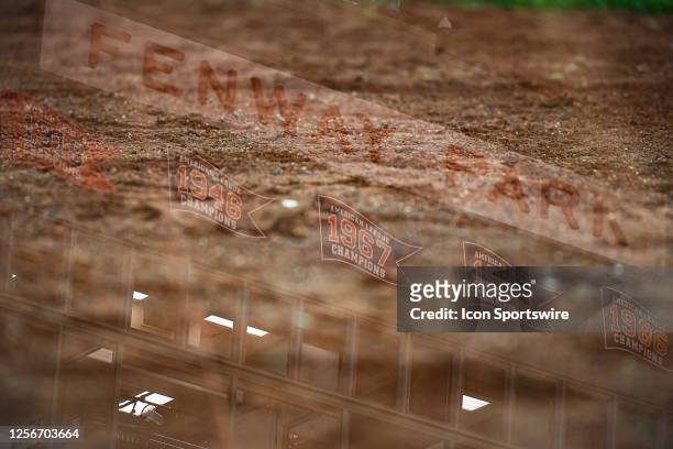 Detail view of the Fenway Park facade and warning track dirt during the ALS Awareness college baseball game between the Notre Dame Fighting Irish and...