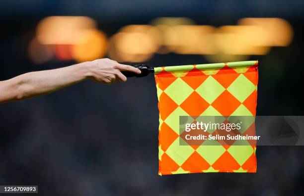 The flag of a assisstant referee is pictured during the Second Bundesliga match between Hamburger SV and SpVgg Greuther Fürth at Volksparkstadion on...