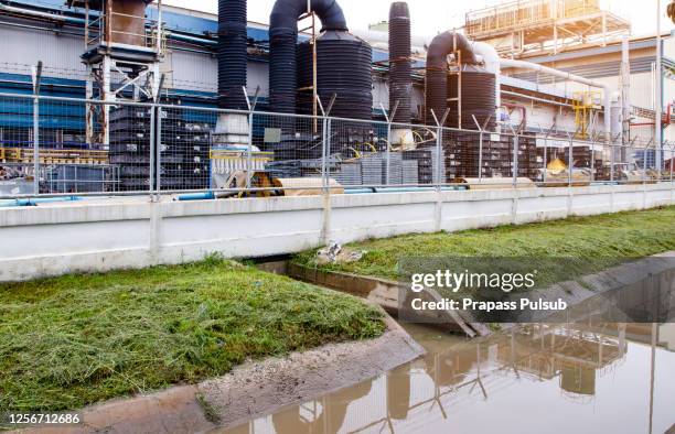 massive white smokes coming out of factory chimney. factory surrounded by smog. air pollution. - contamination stock pictures, royalty-free photos & images