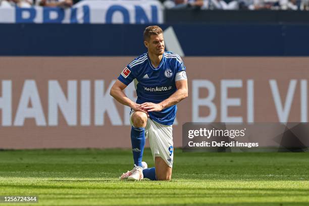 Simon Terodde of FC Schalke 04 looks on during the Bundesliga match between FC Schalke 04 and Eintracht Frankfurt at Veltins-Arena on May 20, 2023 in...