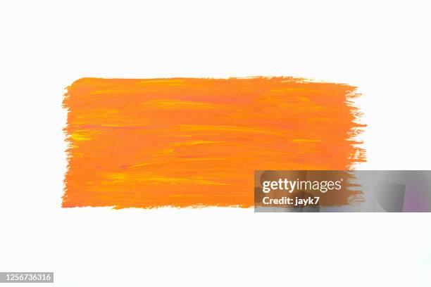 orange yellow paint stroke - brushing stock pictures, royalty-free photos & images