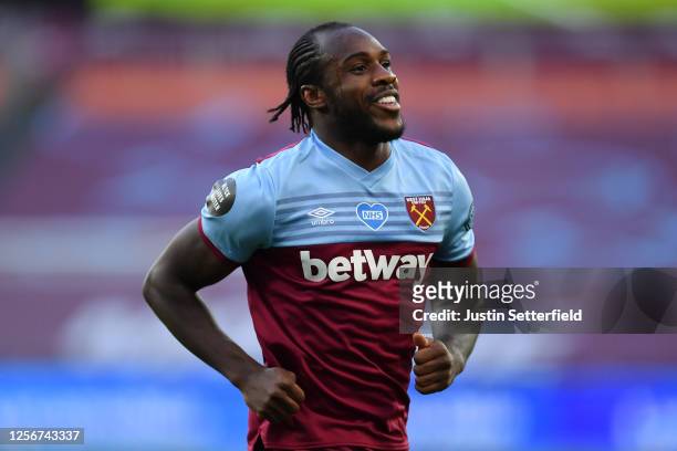 Michail Antonio of West Ham United celebrates after scoring his team's first goal during the Premier League match between West Ham United and Watford...