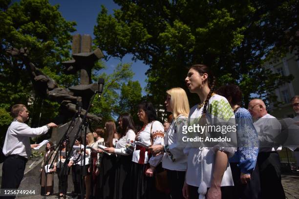 People are seen during memorial services on the Day of Remembrance of the Victims of Political Repression in Lviv, Ukraine on May 21, 2023. The Day...