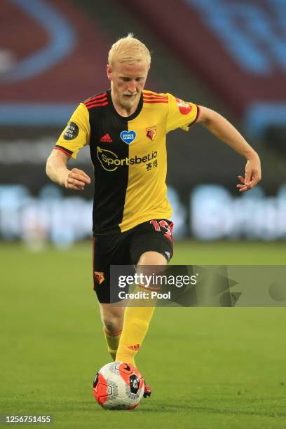 Will Hughes of Watford runs with the ball during the Premier League match between West Ham United and Watford FC at London Stadium on July 17, 2020...