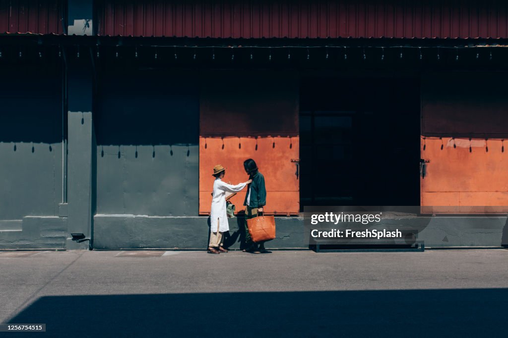 Authentic Couples: Portrait of a Cool Asian Couple Standing on the Street