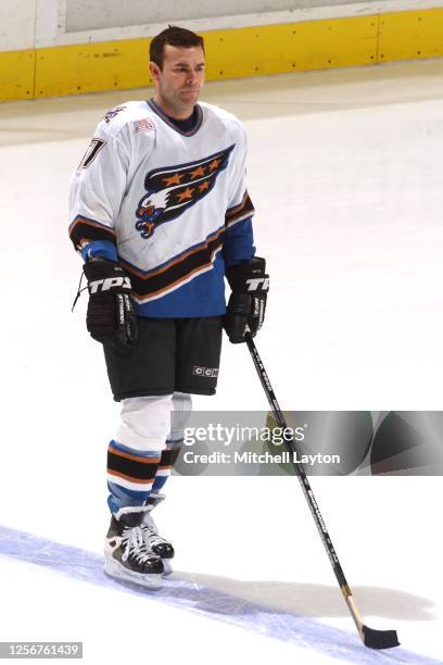 Adam Oates of the Washington Capitals looks on before a NHL hockey game against the St. Louis Blues at MCI Center on January 30, 2002 in Washington,...