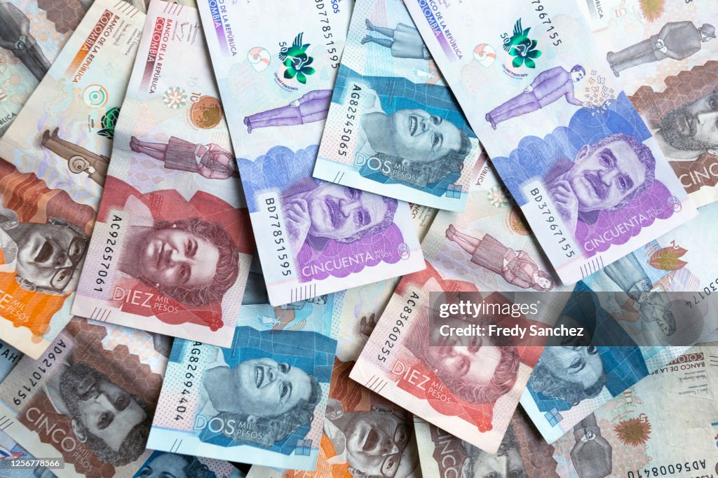 Colombian peso bills of different values close up. Colombian money, paper money, cash. Concept of abundance and prosperity