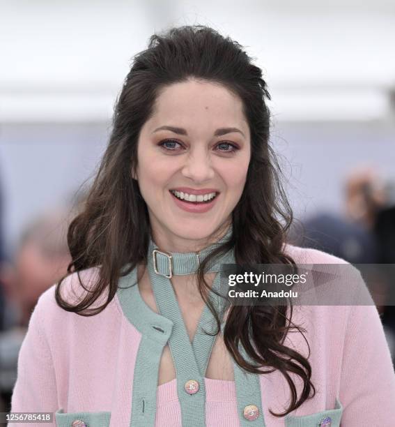 French actress Marion Cotillard poses during a photocall for the film Little Girl Blue at the 76th edition of the Cannes Film Festival at Palais des...