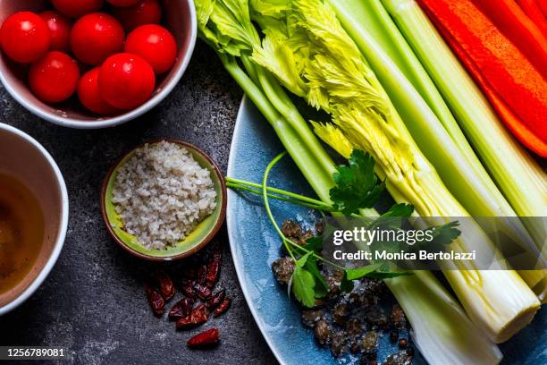 fresh celery and tomato pinzimonio - leve imagens e fotografias de stock