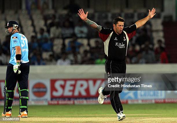 Somerset bowler Peter Trego celebrates the wicket of Auckland Acers batsman J Adams during the Champions League Twenty20 qualifier match between...
