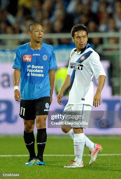 Yuto Nagatomo of FC Inter Milan and Takayuki Morimoto of Novara Calcio look on during the Serie A match between Novara Calcio and FC Internazionale...