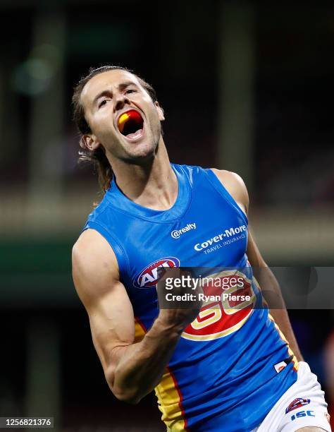 Lachie Weller of the Suns celebrates a goal during the round 7 AFL match between the Sydney Swans and the Gold Coast Suns at Sydney Cricket Ground on...