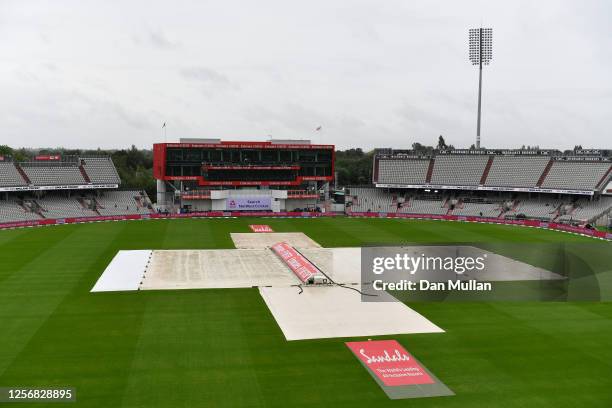 General view of the covers as rain falls prior to Day Three of the 2nd Test Match in the #RaiseTheBat Series between England and The West Indies at...