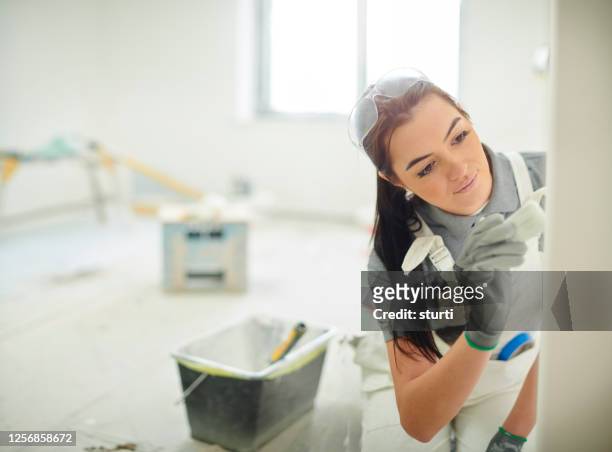 female house painter - decorating stock pictures, royalty-free photos & images