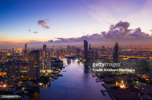 aerial view of bangkok modern office buildings, condominium, living place in bangkok city downtown with sunset scenery, bangkok is the most populated city in southeast asia.bangkok , thailand - bangkok skyline stock pictures, royalty-free photos & images