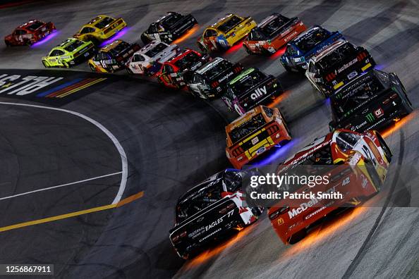 Nascar Glow Racers Cars race with under glow lighting during the NASCAR Cup Series... News ...