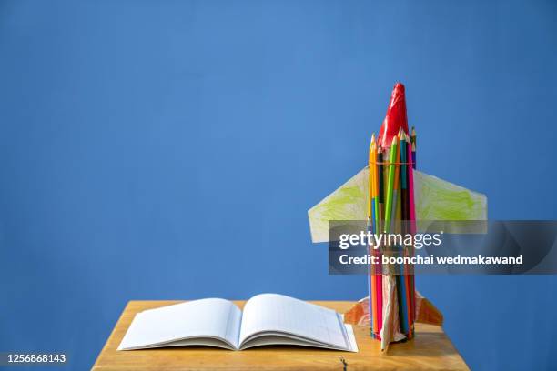 back to school background with rocket made from pencils - writing copy stock pictures, royalty-free photos & images