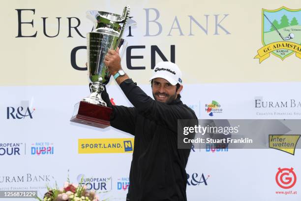 Joel Stalter of France poses with the trophy after winning the Euram Bank Open at Golf Club Adamstal on July 18, 2020 in Ramsau, Austria.