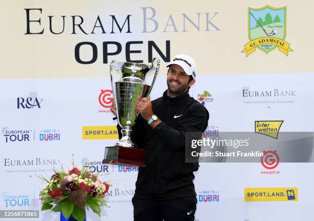 Joel Stalter of France poses with the trophy after winning the Euram Bank Open at Golf Club Adamstal on July 18, 2020 in Ramsau, Austria.