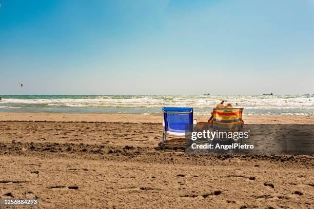 rest time at the beach - malaga beach stock pictures, royalty-free photos & images