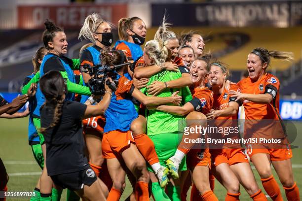 Houston Dash celebrate with goalkeeper Jane Cambell after winning a game between Utah Royals FC and Houston Dash at Zions Bank Stadium on July 17,...