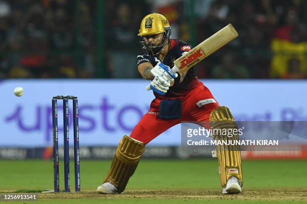 Royal Challengers Bangalore's Virat Kohli plays a shot during the Indian Premier League Twenty20 cricket match between Royal Challengers Bangalore...
