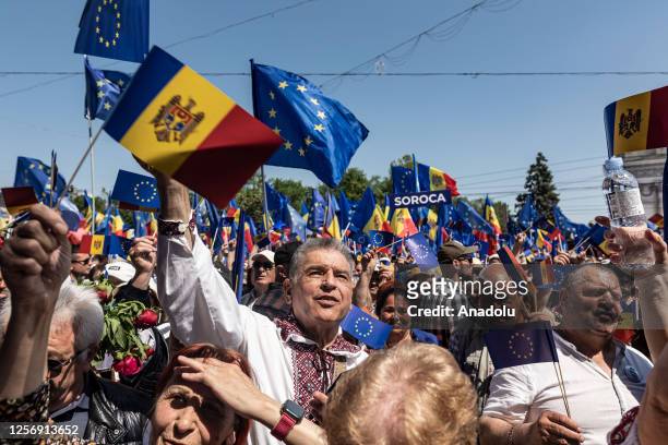 Moldovan citizens with Moldovan and EU flags rally for their desire to join the European Union in Chisinau, Moldova, 21 May 2023. As a result of the...