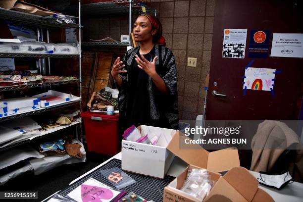 Jeanelle Austin, executive director of the George Floyd Global Memorial, stands in a storage room full of tributes collected at George Floyd Square,...