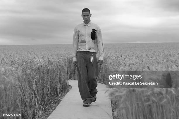 Model walks the runway during "L'Amour" : Jacquemus Spring-Summer 2021 Show on July 16, 2020 in Paris, France.