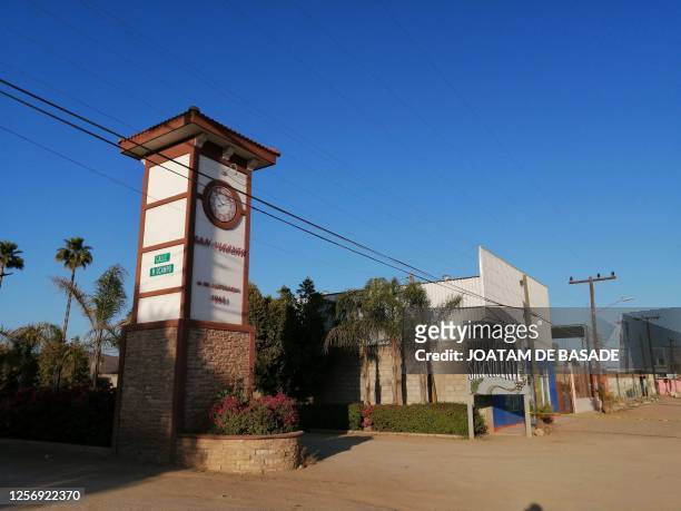 View of the entrance of the town where a long-gun attack on a group of amateur rally drivers took place in Ensenada, Mexico, on May 20, 2023. At...