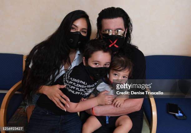 Criss Angel , his wife Shaunyl Benson with sons Johnny Crisstopher Sarantakos and Xristos Yanni Sarantakos attend the unveiling of a large scale...