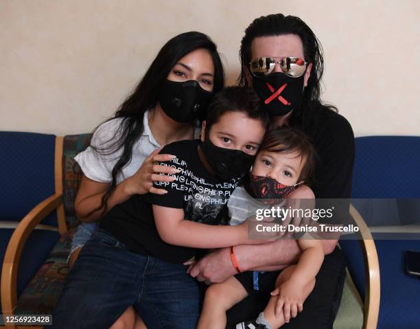 Criss Angel , his wife Shaunyl Benson with sons Johnny Crisstopher Sarantakos and Xristos Yanni Sarantakos attend the unveiling of a large scale...