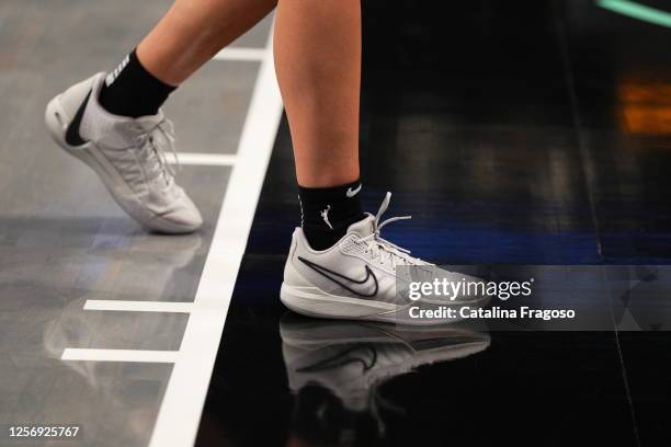 Sabrina Ionescu of the New York Liberty warms up in the Nike Sabrina 1 in "Ionic" colorway before the game against the Indiana Fever on May 21, 2023...