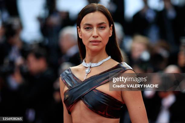 Russian model Irina Shayk arrives for the screening of the film "Firebrand" during the 76th edition of the Cannes Film Festival in Cannes, southern...