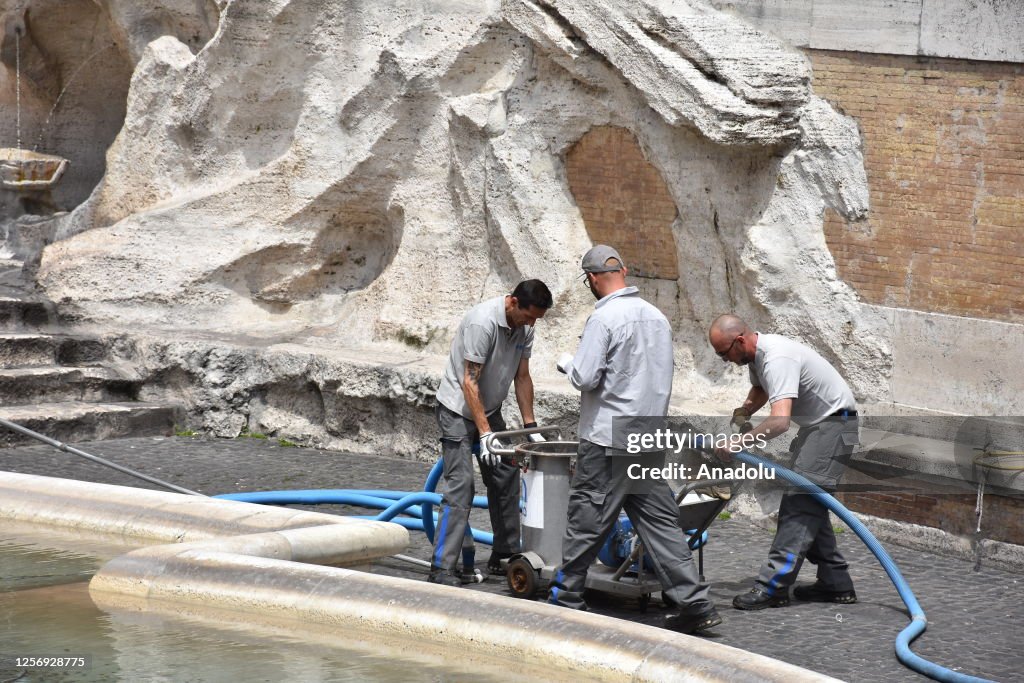 Climate activists pour black coal-based liquid into world-famous historical Trevi Fountain