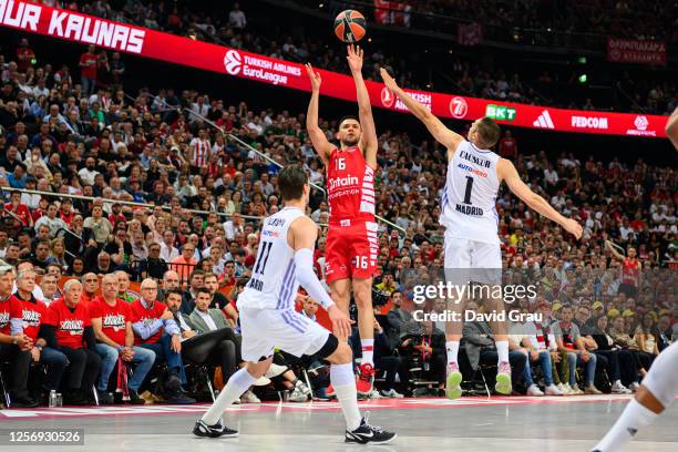 Kostas Papanikolaou, #16 of Olympiacos Piraeus competes with Fabien Causeur, #1 of Real Madrid during Turkish Airlines EuroLeague Final Four Kaunas...