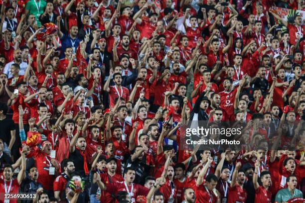Fans of Al-Ahly during the CAF Champions League semi-final football match between Egypt's Al-Ahly and Tunisia's Esperance Sportive de Tunis at the...