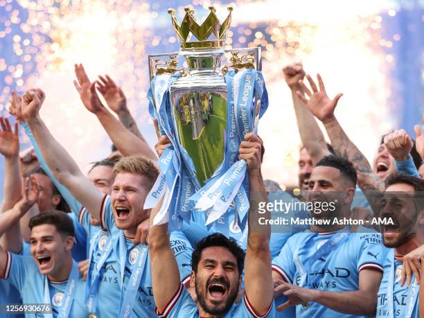 Ilkay Gundogan of Manchester City lifts the Premier League trophy during the Premier League match between Manchester City and Chelsea FC at Etihad...