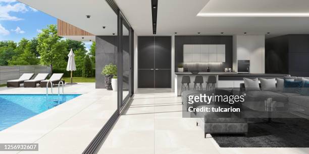 luxurious villa interior with swimming pool at summer daylight scene - luxury mansion interior stock pictures, royalty-free photos & images