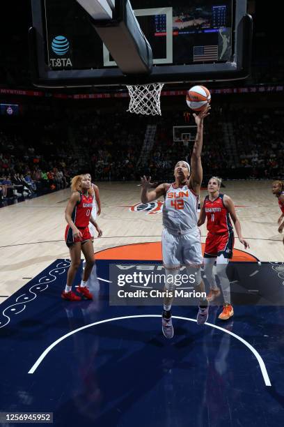 Brionna Jones of the Connecticut Sun shoots the ball during the game against the Washington Mystics on May 21, 2023 at the Mohegan Sun Arena in...