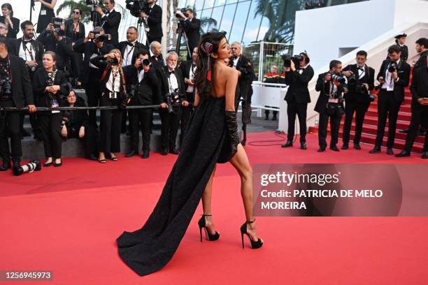 Japanese model Rola arrives for the screening of the film "Firebrand" during the 76th edition of the Cannes Film Festival in Cannes, southern France,...