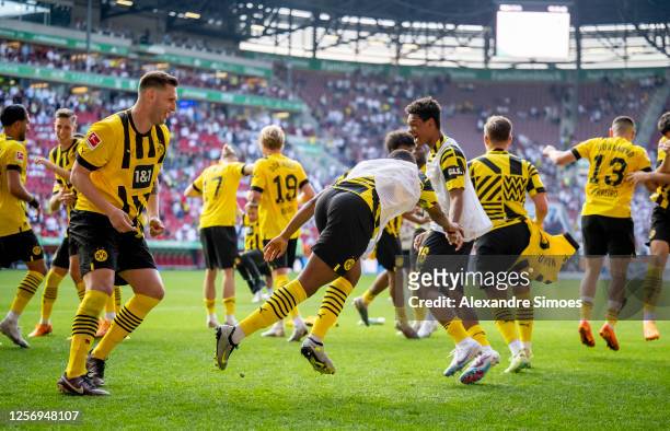 Players of Borussia Dortmund are celebrating the victory after the Bundesliga match between FC Augsburg and Borussia Dortmund at WWK-Arena on May 21,...