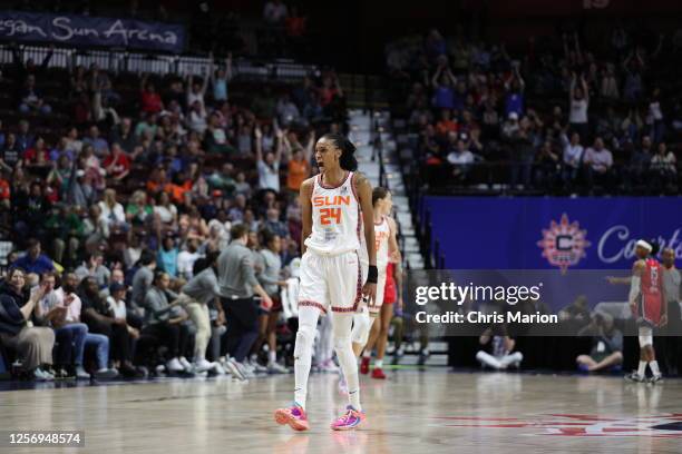 DeWanna Bonner of the Connecticut Sun celebrates a three point basket during the game against the Washington Mystics on May 21, 2023 at the Mohegan...