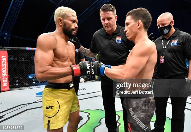 Deiveson Figueiredo of Brazil and Joseph Benavidez face off prior to their UFC flyweight championship bout during the UFC Fight Night event inside...