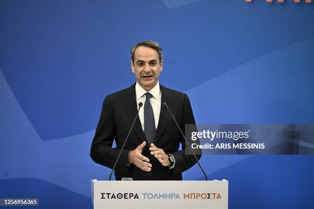 Prime Minister and New Democracy party's leader Kyriakos Mitsotakis delivers a speech after his party's victory in elections in Athens, on May 21,...