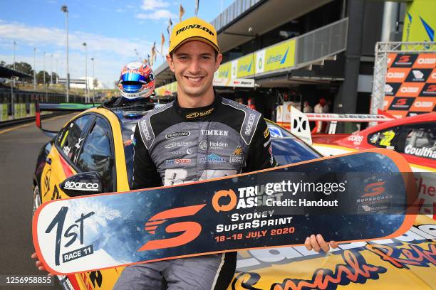 In this handout photo provided by Edge Photographics, Nick Percat driver of the Brad Jones Racing Commodore ZB poses after winning race 11, during...