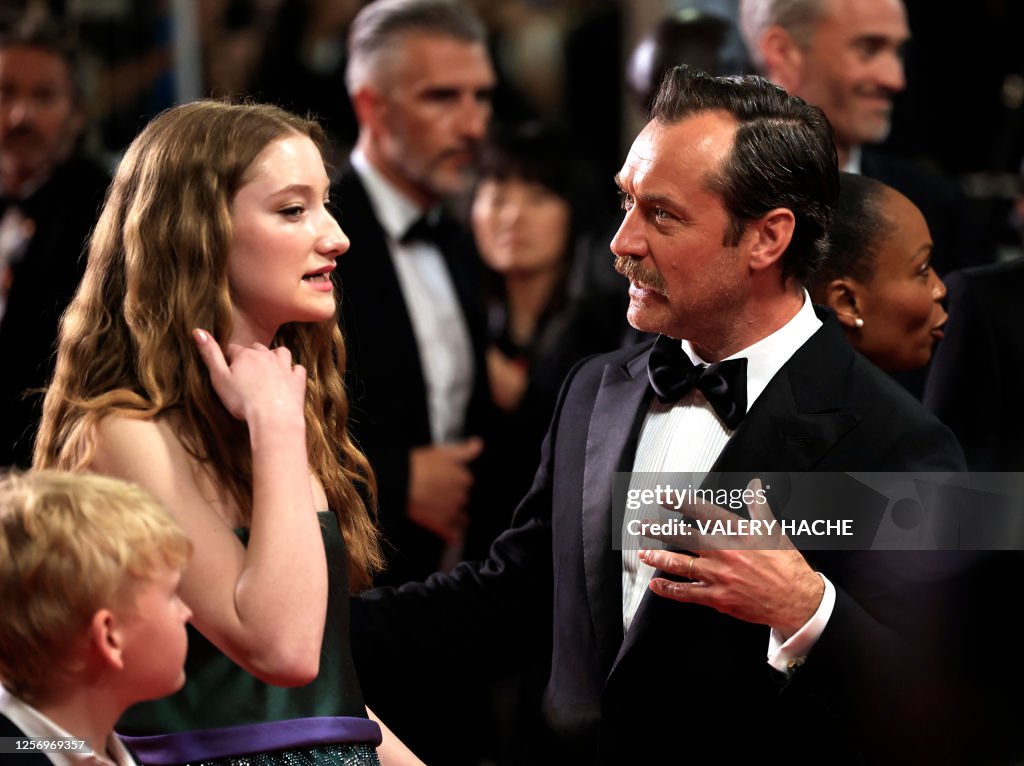 Junia Rees Elizabeth British actor Jude Law speaks with British actress Junia Rees as they ...
