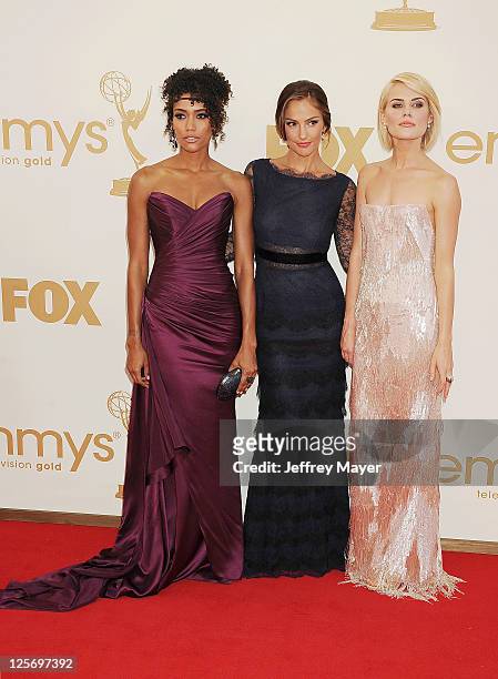 Annie Ilonzeh, Minka Kelly and Rachael Taylor arrive at the 63rd Primetime Emmy Awards at the Nokia Theatre L.A. Live on September 18, 2011 in Los...