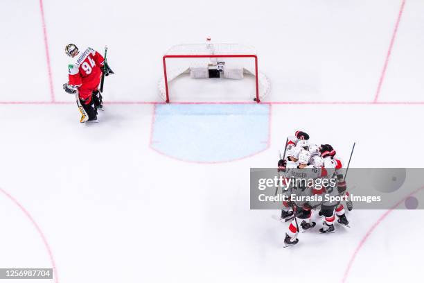 Swiss squad celebrates Andres Ambuhl of Switzerland for his second goal during the 2023 IIHF Ice Hockey World Championship Finland - Latvia game...